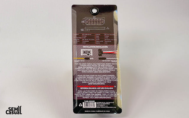 Trux 6″ Red Stop, Turn & Tail to White Back Up LED Oval Light – 12 Diodes